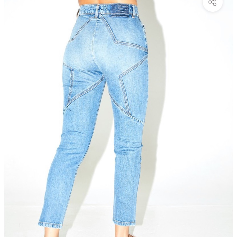 Revice straight leg jean with star on butt.